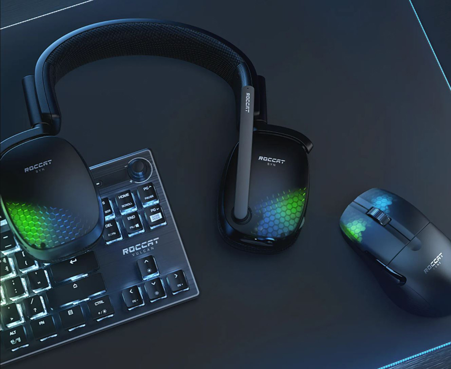 A headset is next to a mouse and a keyboard